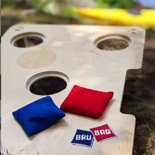 Load image into Gallery viewer, cover shot of bru bag with a red and blue bag
