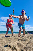 Load image into Gallery viewer, guy tossing a frisbee with beer in hand
