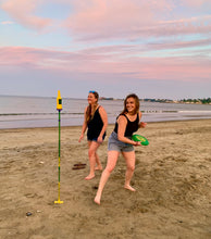 Load image into Gallery viewer, two girls playing bottle bash on the beach 
