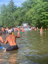 Load image into Gallery viewer, picture of bottle bash being played in a lake with a big crowd
